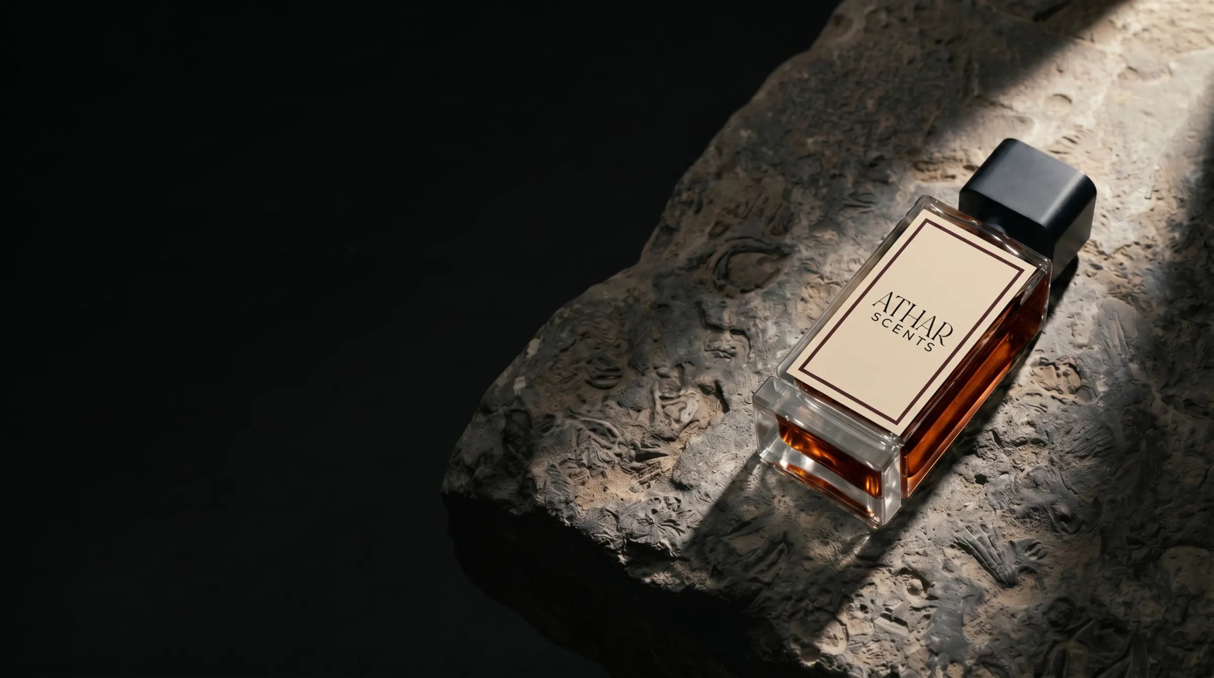 Bottle on weathered stone in hard side light