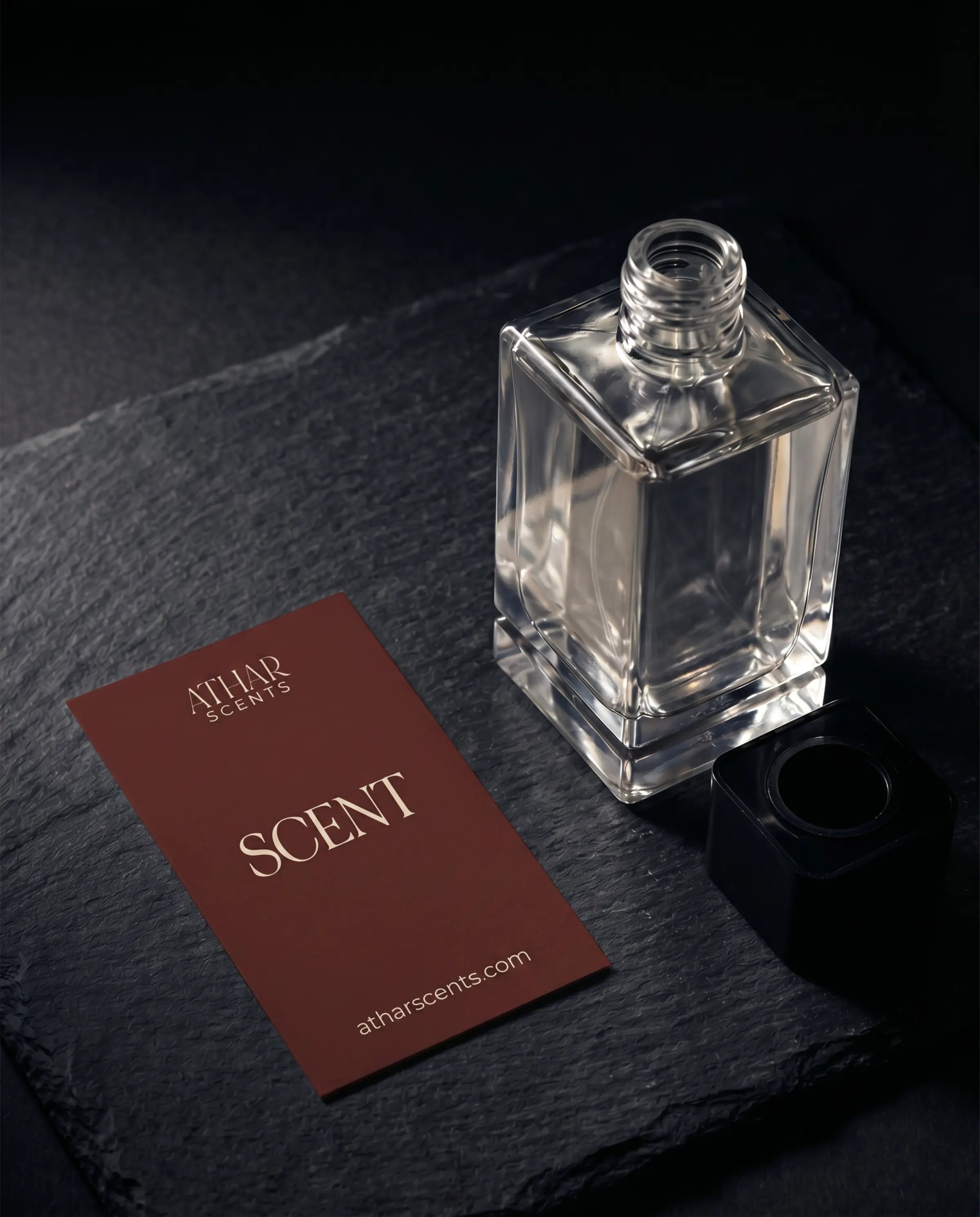 Blueprint card laid next to open bottle